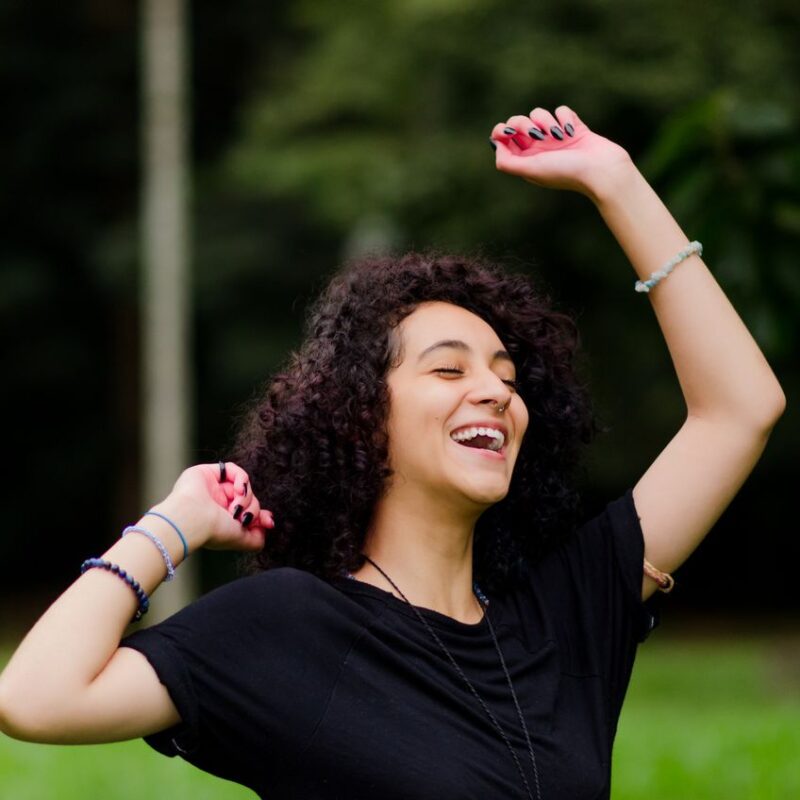 shallow-focus-photo-of-woman-in-black-shirt